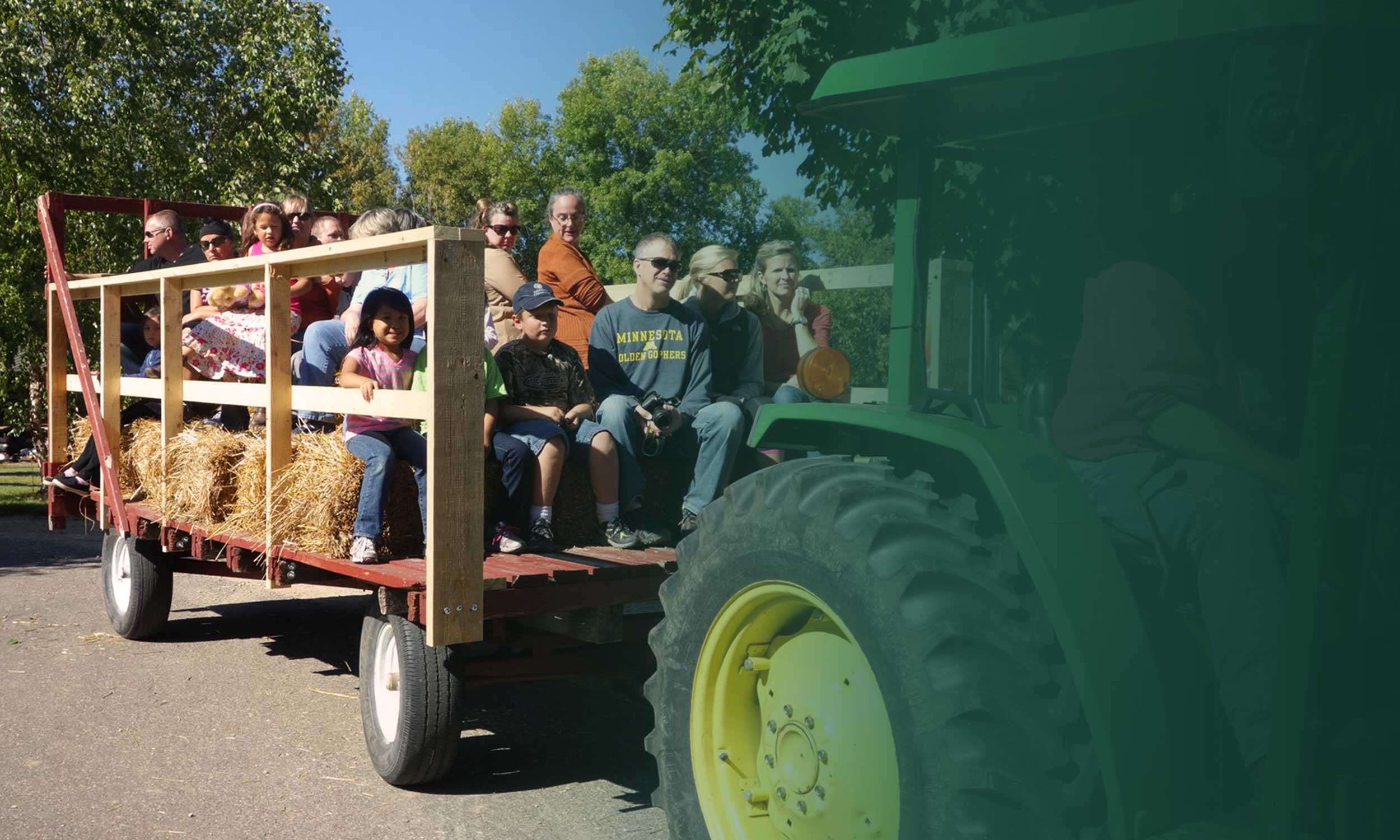 A scenic hayride into our MN u-pick apple orchards. A scenic hayride into our MN u-pick apple orchards.